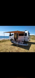 Nissan caravan tidy low kms completely off grid. photo 1